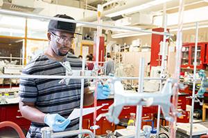 Student works in chemistry lab.